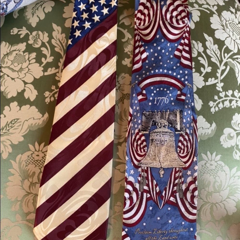 2 men’s ties both new one with tag. Brands are Steven Harris, tango both for $55